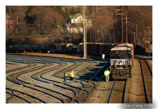 Rail Road Workers board train on a cold morning